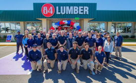 84 Lumber moves to a new, expanded facility near Sarsota, Fla. (Pictured: 84 Lumber associates gathered together.)